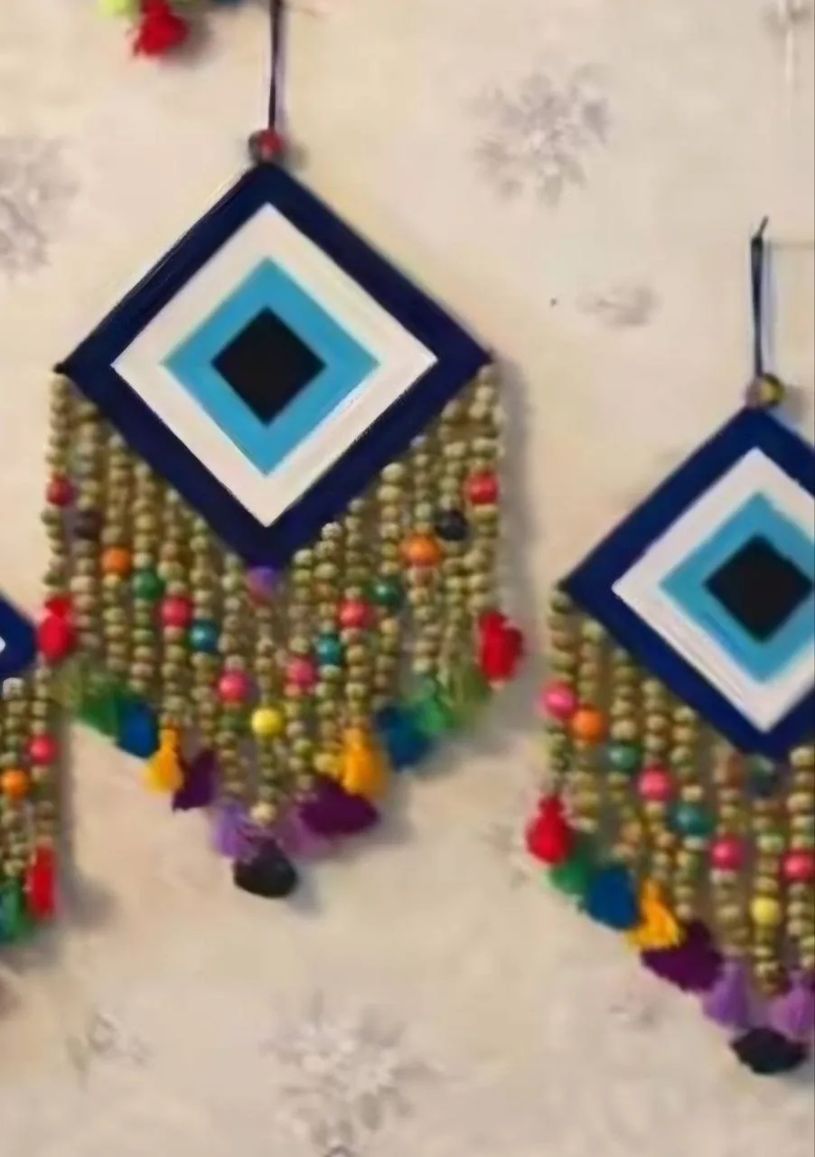Diamond-shaped esfand wall hanging from the family story